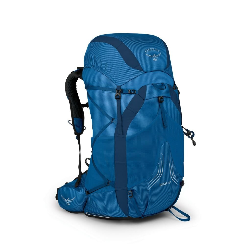 A heavily overloaded Osprey Exos 58 backpack being carried through the mud on the West Coast Trail.